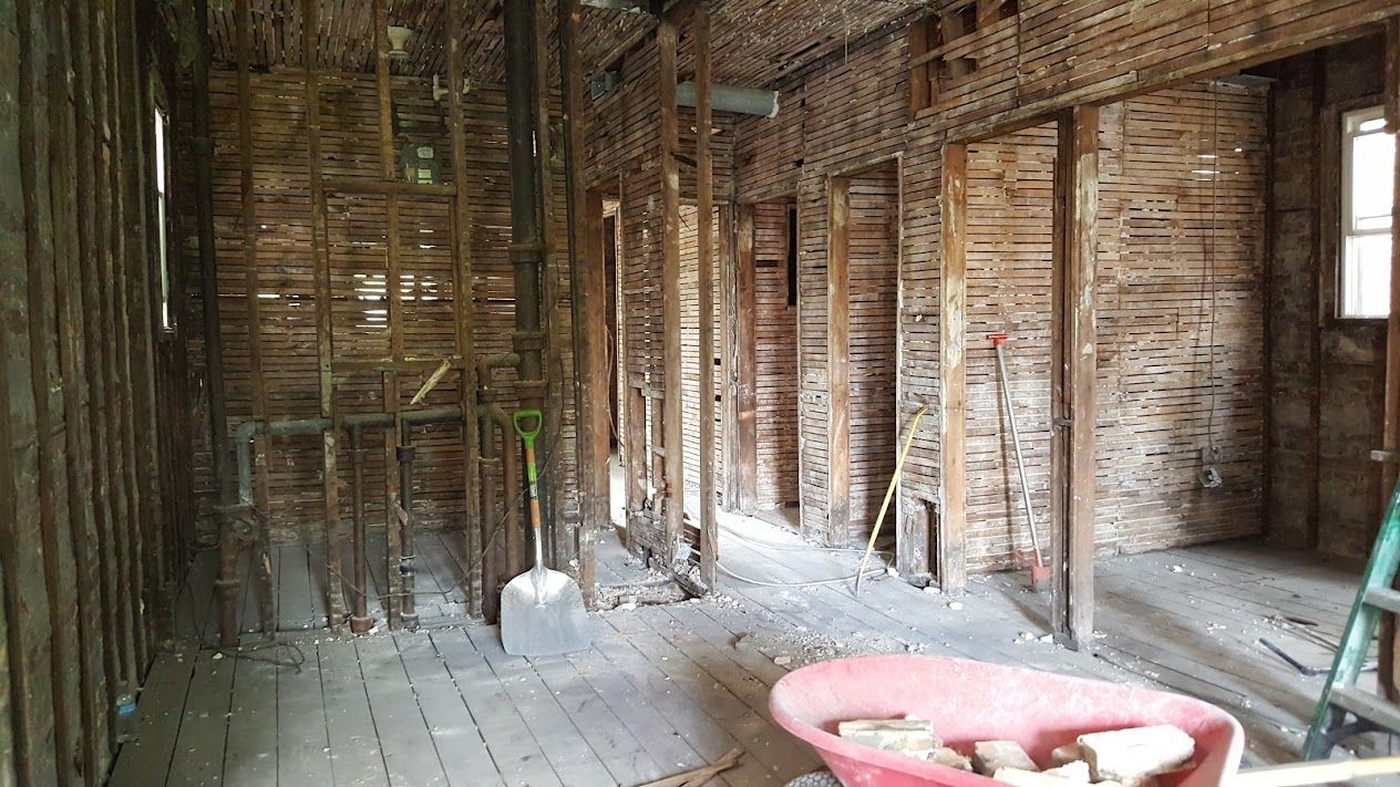 Apartment interior stripped to the studs