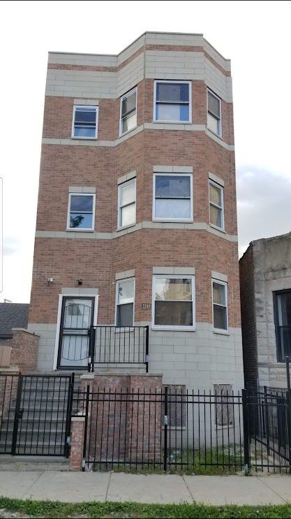 Completed brick three-flat in North Lawndale
